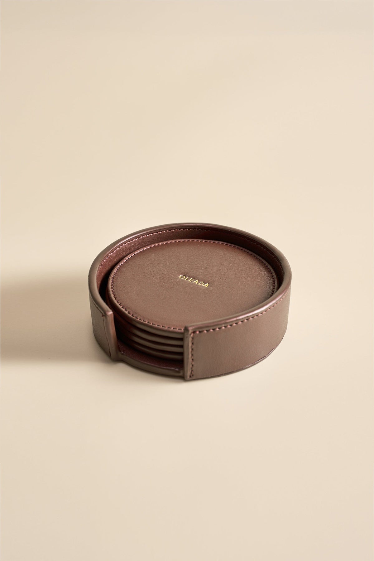 OLEADA NYC Apparel and Accessories > Women > Small Leather Goods > Leather Cardholder Color_Chocolate Sip N Stay Coasters (Set of 4)