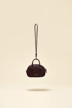 OLEADA NYC Apparel and Accessories > Women > Small Leather Goods > Leather Case Color_Chocolate Marina Carryall Charm