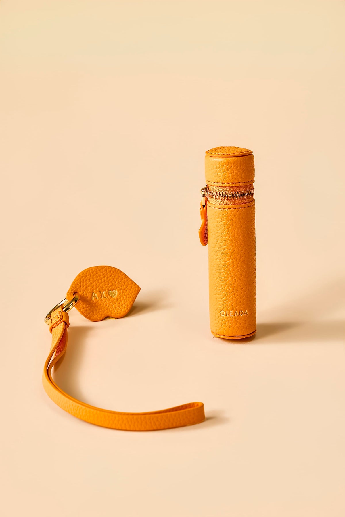 OLEADA NYC Apparel and Accessories > Women > Small Leather Goods > Leather Case Color_Marigold The Lip Capsule Charm